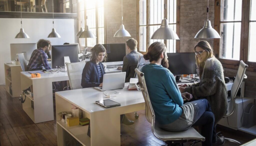 Young creative business people working in the office