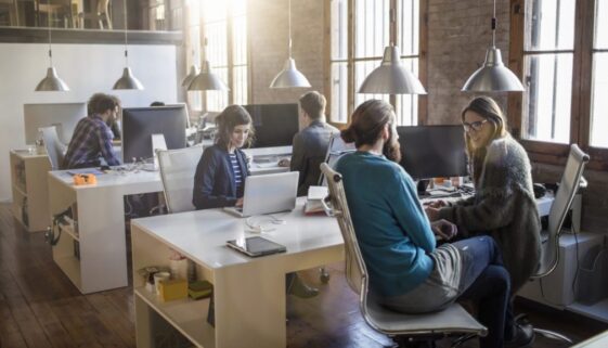 Young creative business people working in the office