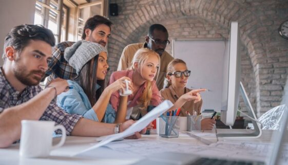 Photo of a designer team working on a project