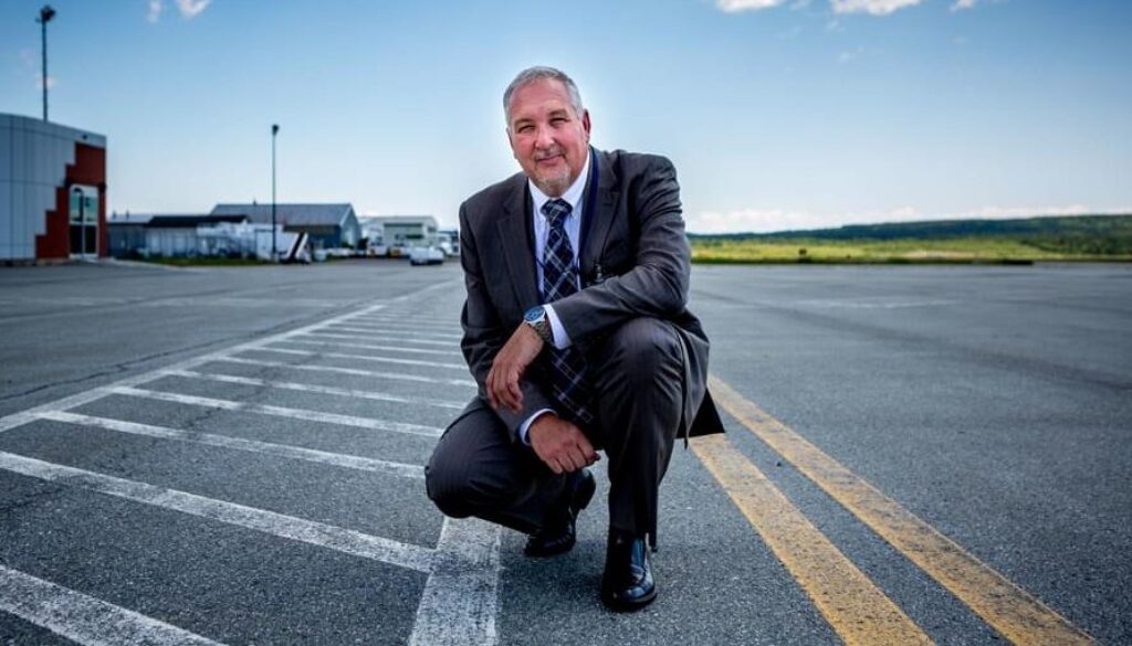 Derrick kneeling runway