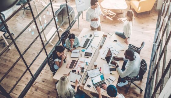 Young people work in modern office.