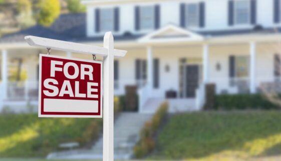 Home For Sale Sign in Front of New House