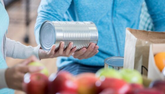 Food bank volunteer organize food donations