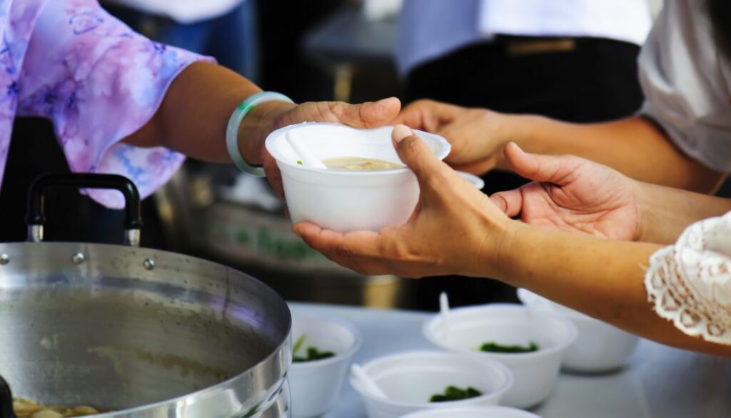 Feeding the poor to help each other in society. Charity concept