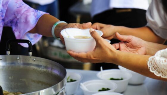 Feeding the poor to help each other in society. Charity concept