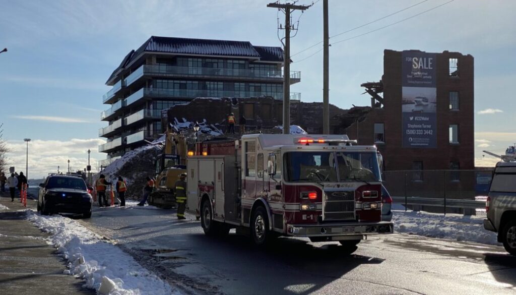 Emergency crews responded to 222 Water Street on Dec. 20, 2021, after an excavator fell through the building while it was being demolished. (Image Brad Perry)