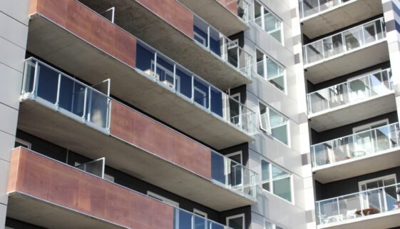 apartment building rent Trevor Nichos-min