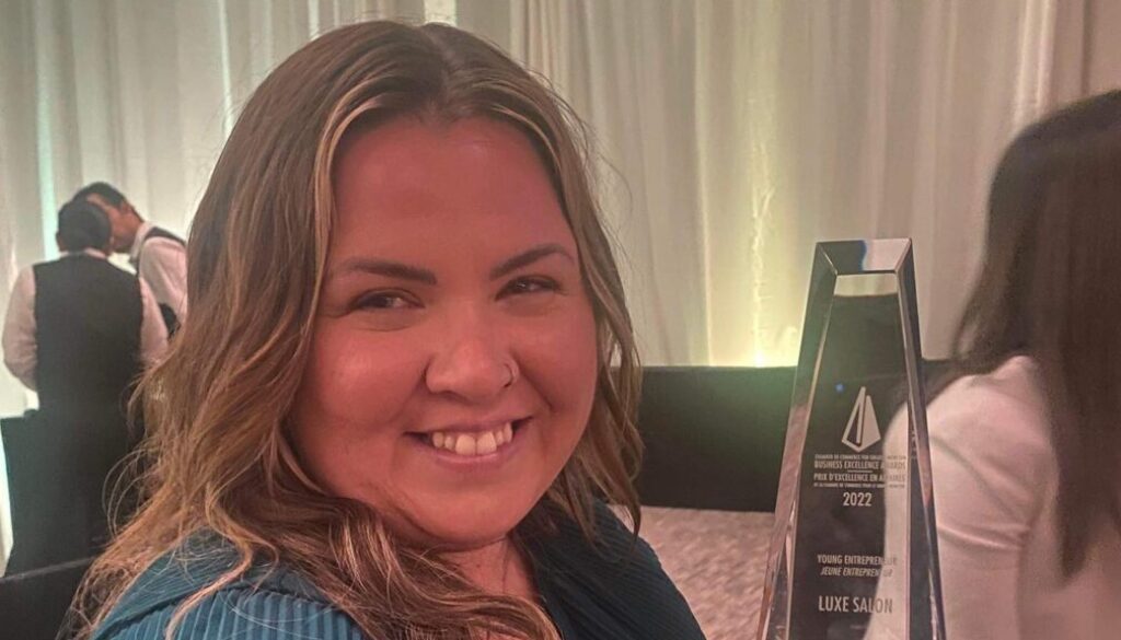 Ashley McDavid with award