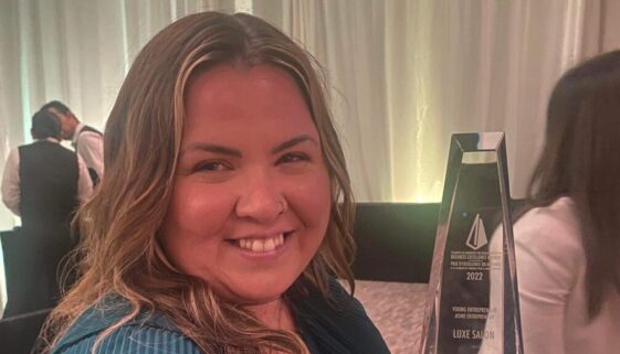 Ashley McDavid with award