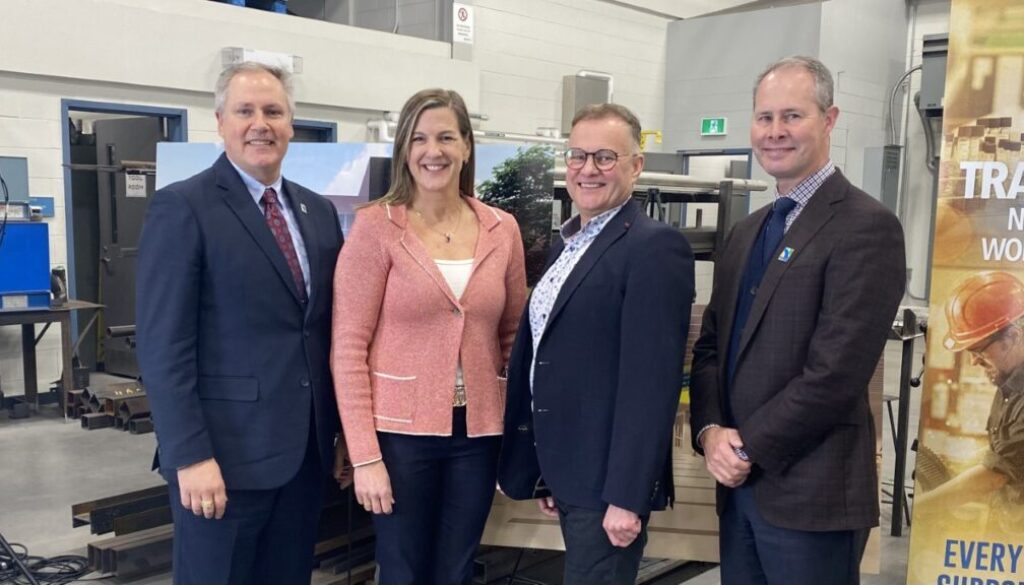 From left to right: Saint John East MLA Glen Savoie, NBCC president and CEO Mary Butler, Saint John-Rothesay MP Wayne Long, and NBCC board chair Mark Flint. Image Brad Perry