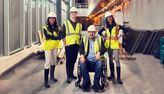 Students Lydia Lee, Joe Yurchesyn, Director Michael Sanderson and Jada Joseph tour the new Arthur L. Irving Entrepreneurship Centre under construction