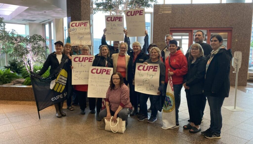 Members of the New Brunswick Council of Nursing Home Unions pose for a photo with Saint John Harbour MLA Arlene Dunn following a meeting on June 26, 2023. Image Brad Perry
