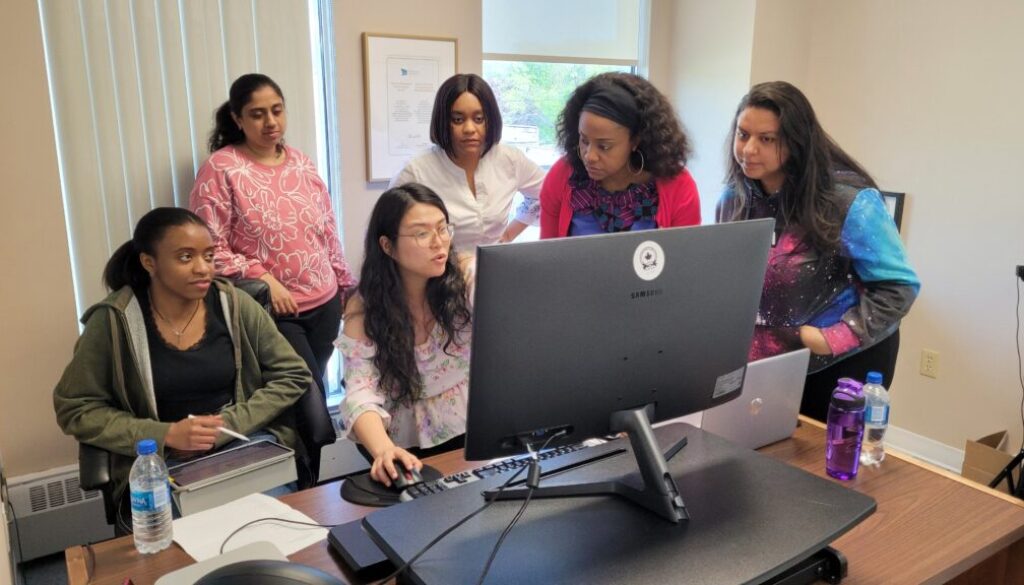 Newcomer_volunteers_and_students_gain_job-ready_skills_by_collaborating_seamlessly_with_the_PRUDE_Inc._team-min