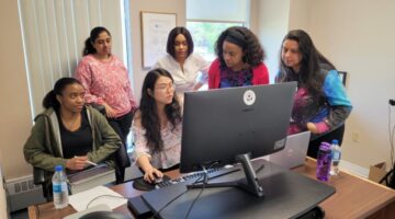 Newcomer_volunteers_and_students_gain_job-ready_skills_by_collaborating_seamlessly_with_the_PRUDE_Inc._team-min